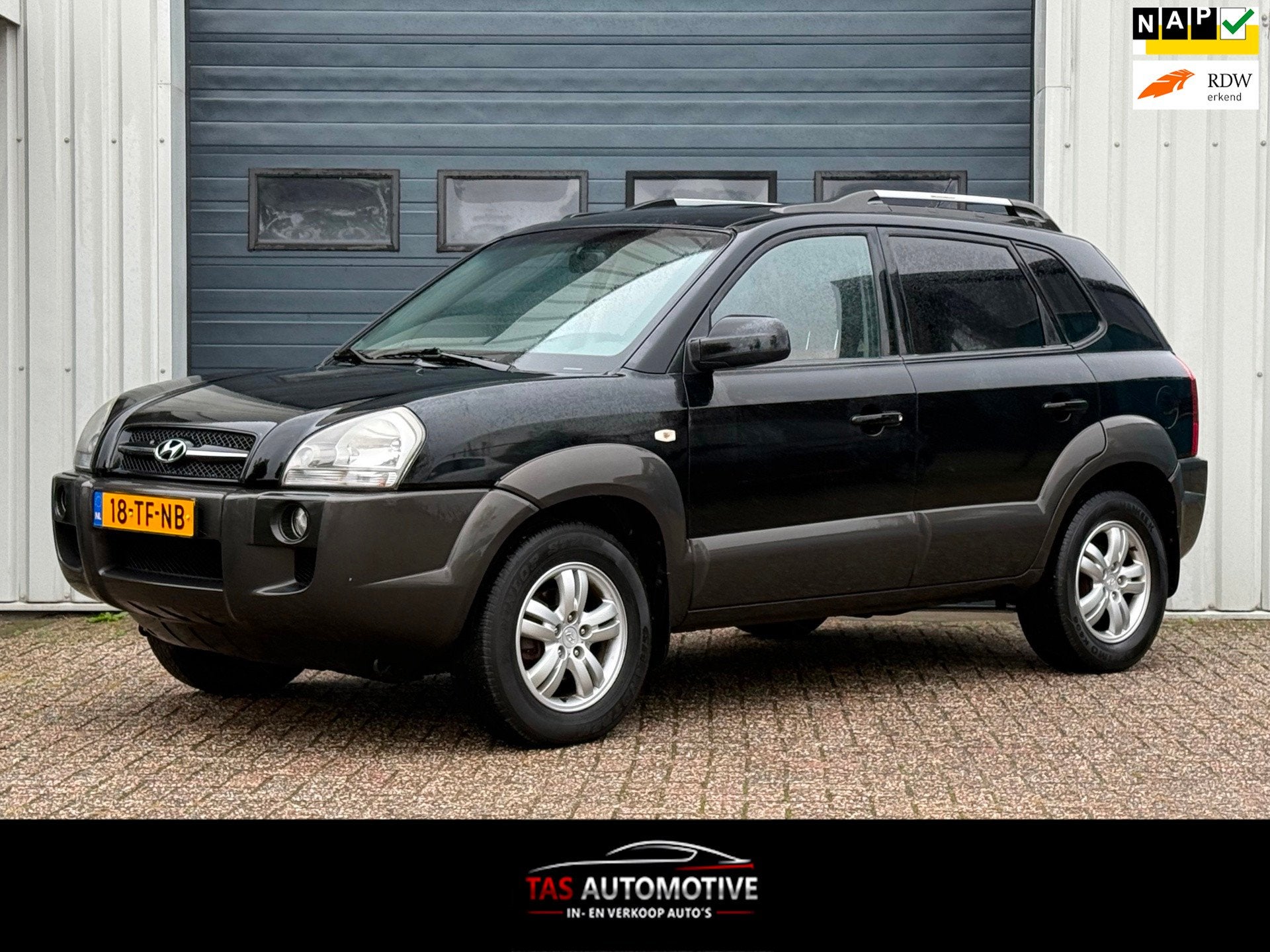 Hyundai Tucson 2.0i Style World Cup edition CLIMA/CRUISE/NAP, Gebruikt, 4 cilinders, Zwart, Handgeschakeld