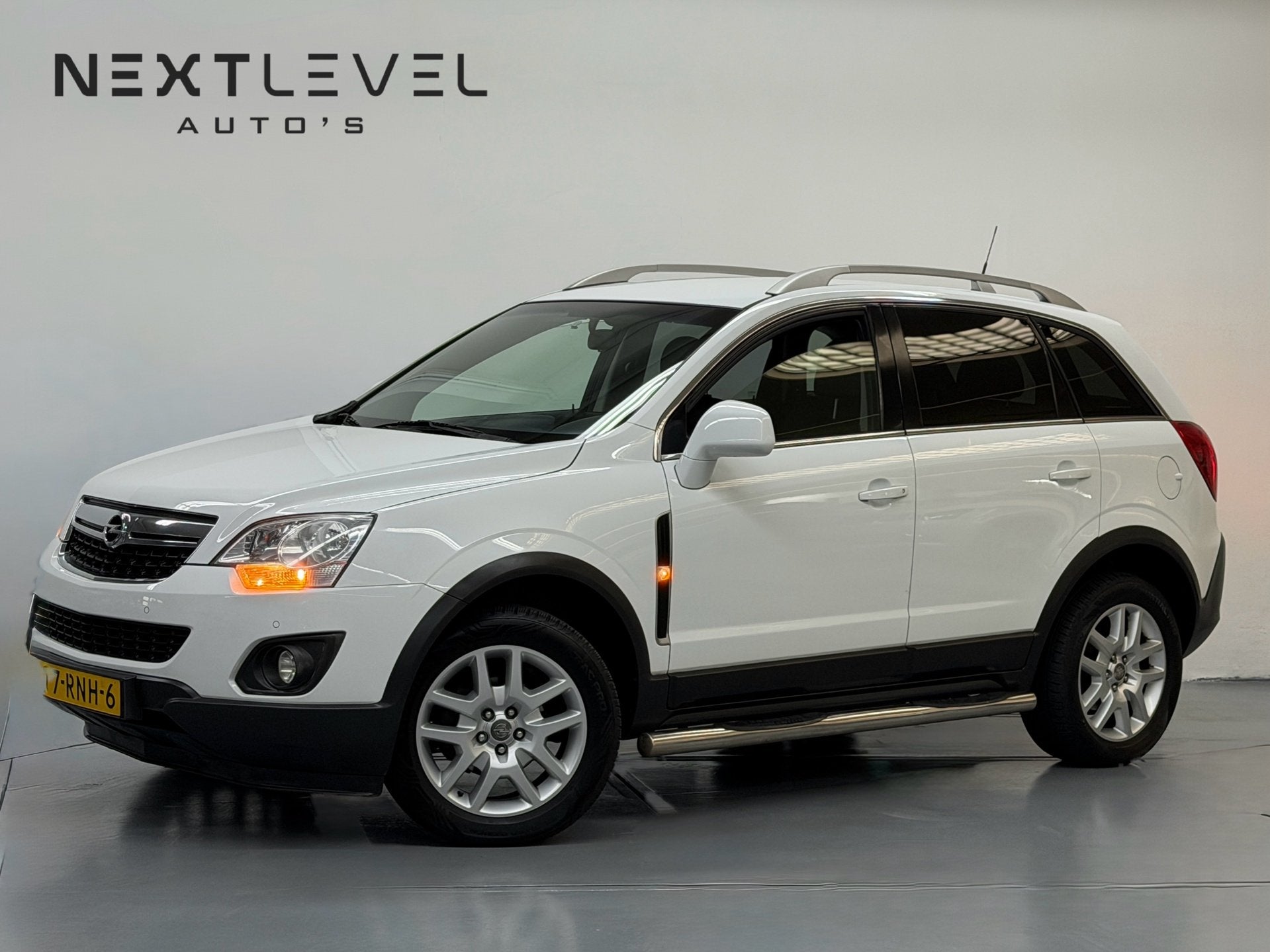 Opel Antara 2.4-16V Edition 2x4 Trekhaak Stoelverwarming Cru, Auto's, Voorwielaandrijving, Euro 5, Gebruikt, Zwart