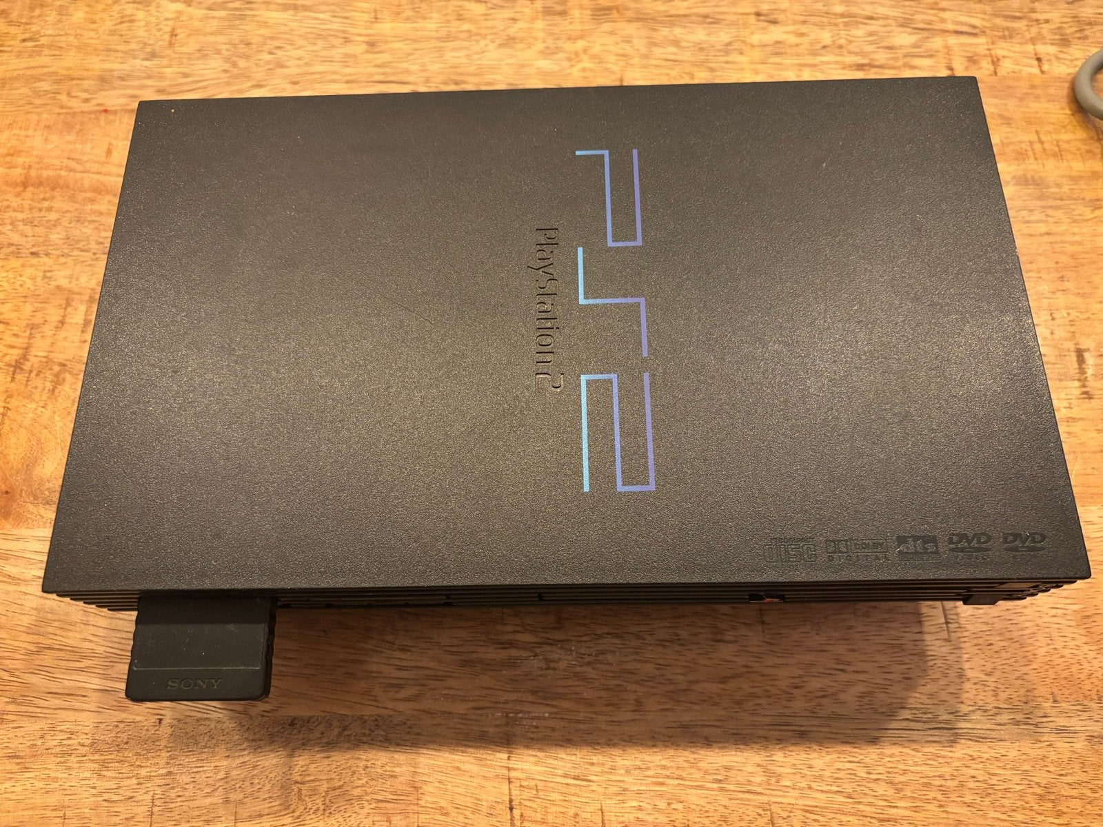 PlayStation 2 Slim met 2 controllers en 10 games, Spelcomputers en Games, Zwart, Met 2 controllers, Ophalen of Verzenden, Slim