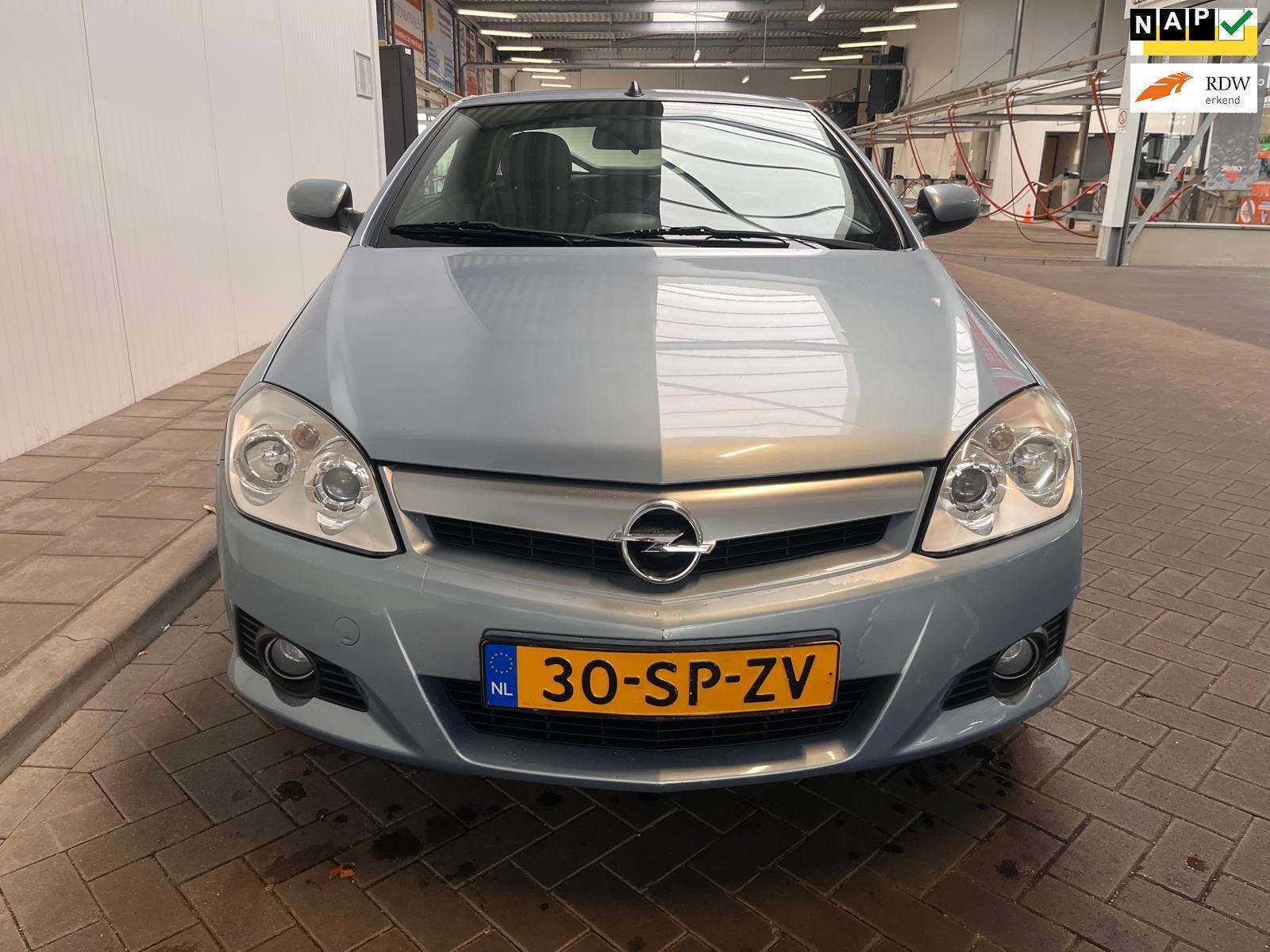 Opel Tigra TwinTop 1.4-16V Linea Rosso, Auto's, Opel, Stof, Gebruikt, Zwart, 4 cilinders