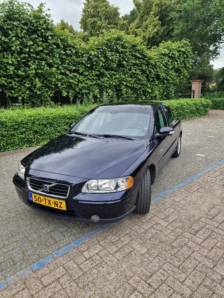 Volvo S60 2.4 140PK AUT 2007 Blauw, Auto's, Parkeersensor, Blauw, S60, 75 €/maand
