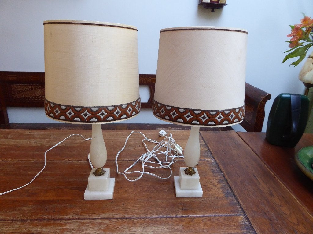 2 albasten lampen met messing details