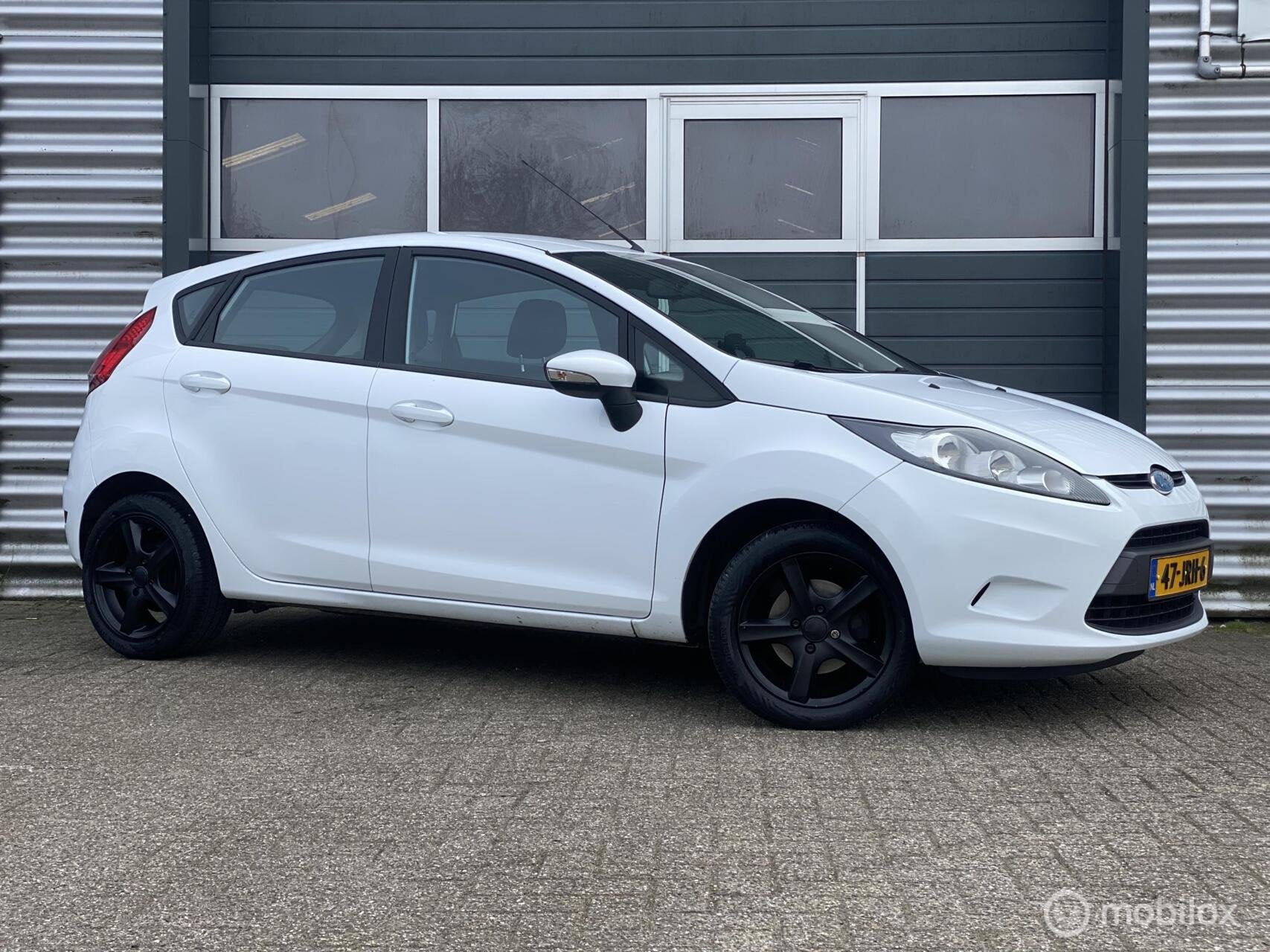 Ford Fiesta 1.25 Titanium 5D|O-houdshist|15 Inch|Nette Auto!, Voorwielaandrijving, 1242 cc, 4 cilinders, 60 pk