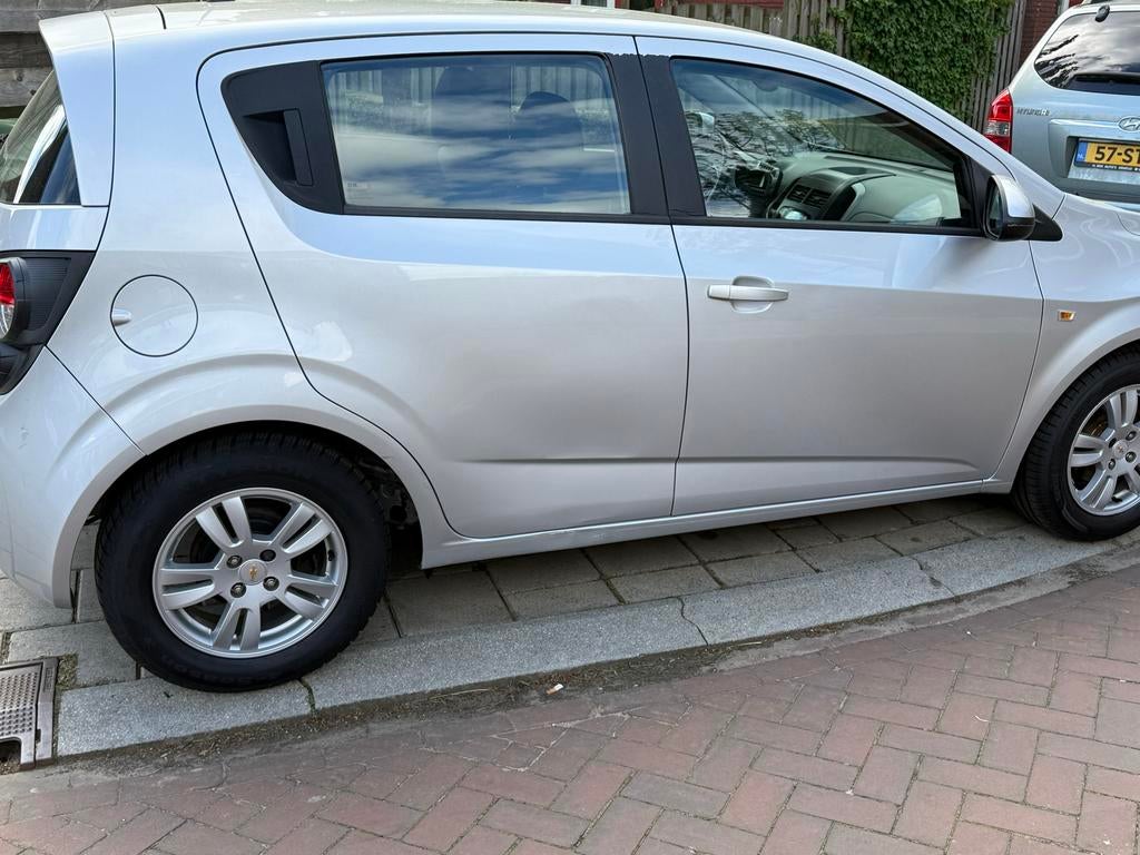 Chevrolet Aveo 1.2 5-DEURS 2013 Grijs, Auto's, Chevrolet, 40 €/maand, Aveo, 4 cilinders, 1039 kg