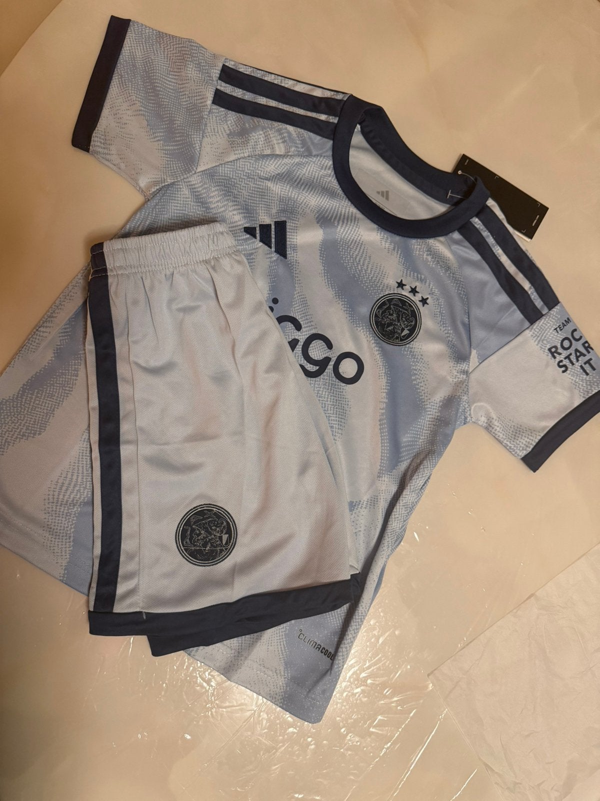 Ajax Derde Tenue 2026/2027 – Lichtblauw Kinder Trainingsset, Blauw, Overige maten, Ophalen of Verzenden, Zo goed als nieuw
