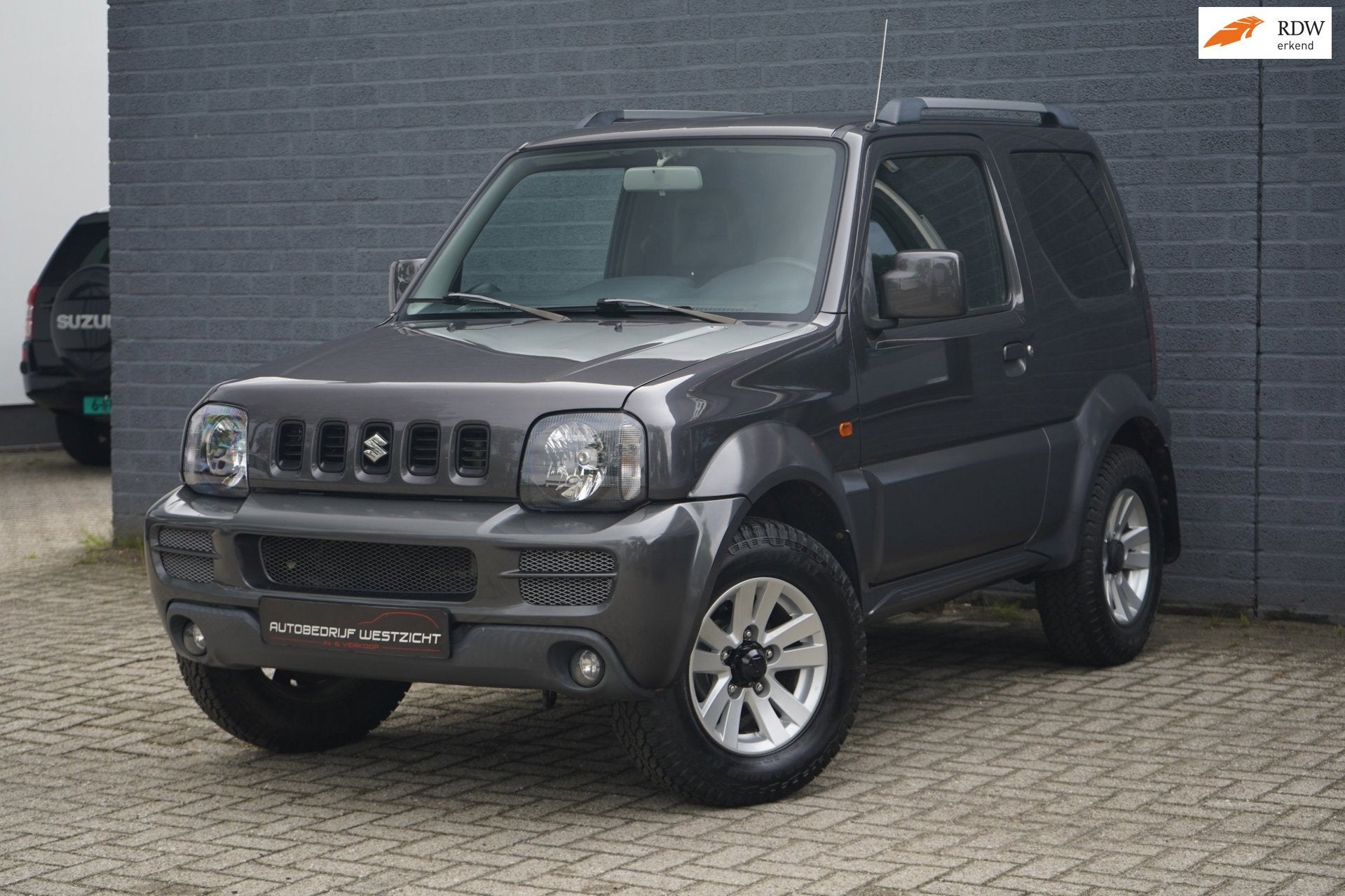 Suzuki Jimny 1.3 Style! 4WD, Leder, Airco, Trekhaak, Stoelv., Auto's, Suzuki, 86 pk, Gebruikt, Zwart, 4 stoelen