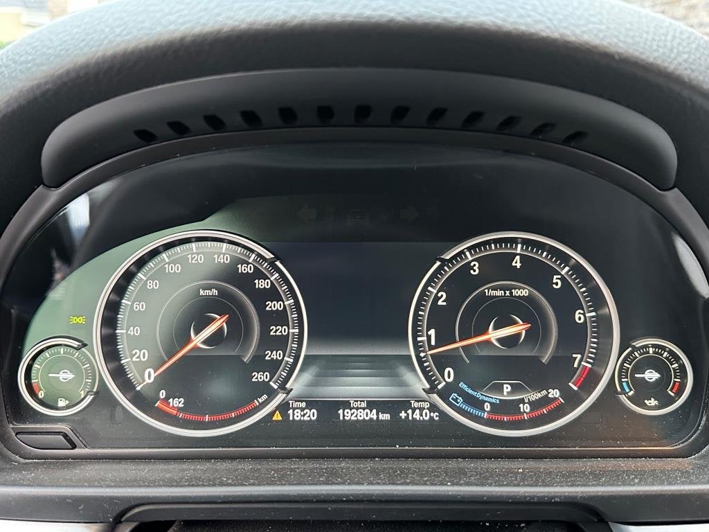 Foto 9 van BMW 5-serie Touring 520i High Executive netteauto/keurigonde
