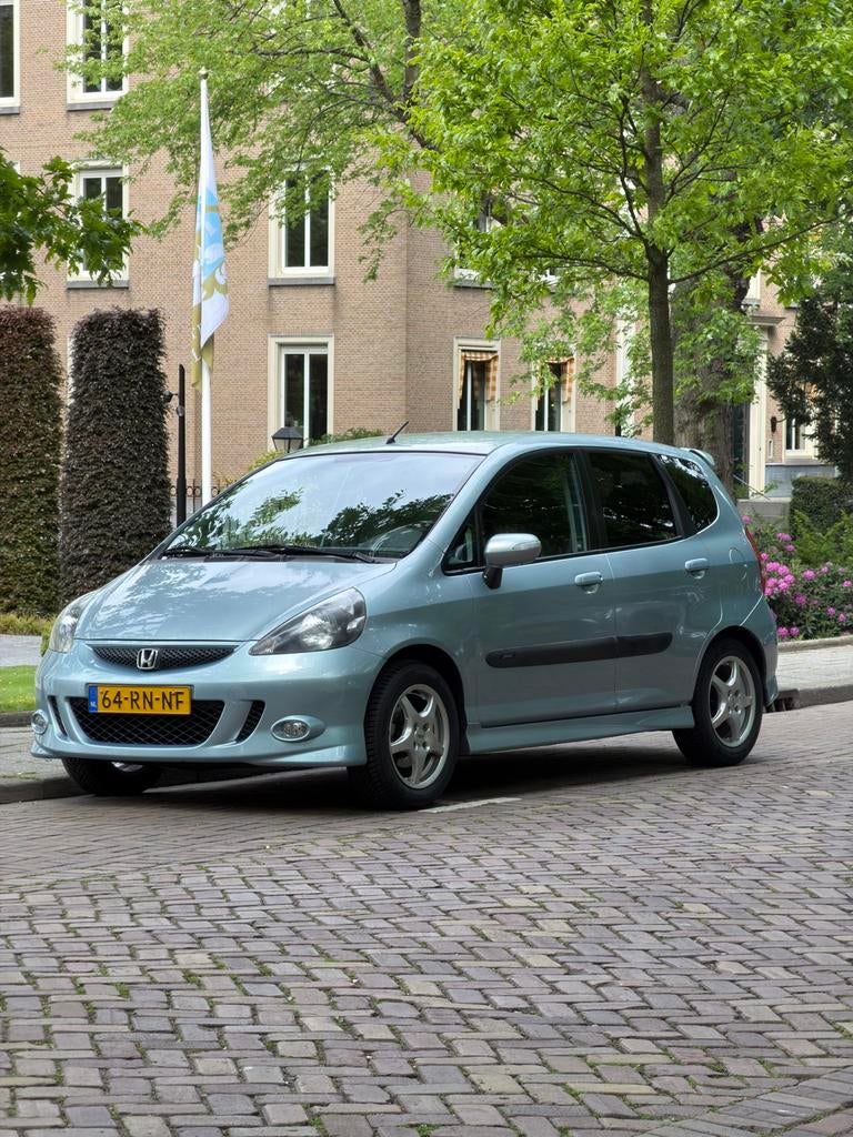 Honda Jazz 1.4 I ES Sport 2005 Blauw, Auto's, Voorwielaandrijving, 83 pk, 40 €/maand, Zwart