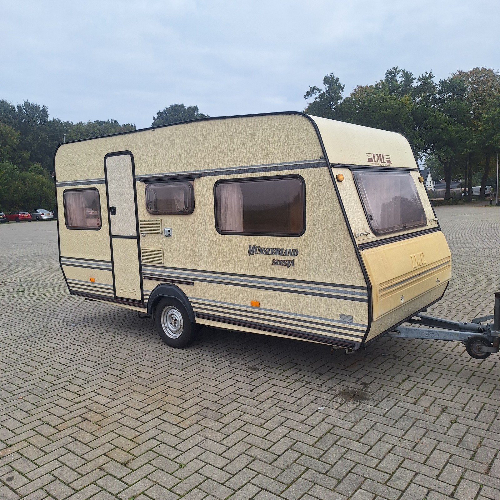 LMC Munsterland Siësta 420, Voortent+luifel zgan, Opknapper, Dwarsbed, Bedrijf, Treinzit, 4 tot 5 meter