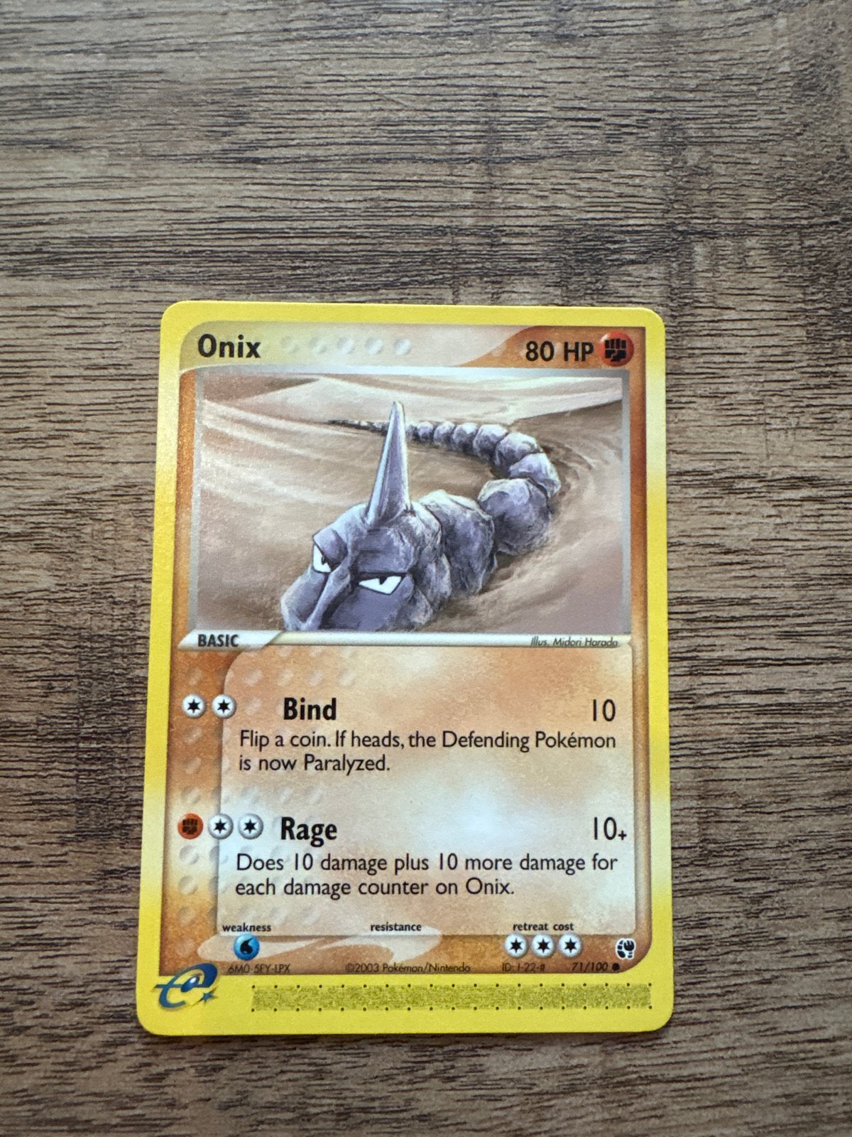 Onix Pokémon kaart (2003) - Exclusieve editie, Ophalen of Verzenden, Zo goed als nieuw, Losse kaart