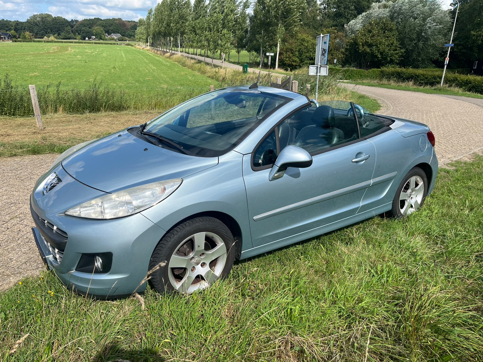 Peugeot 207 1.6 VTI CC 88KW AUT 2010 Blauw, Auto's, Zwart, 4 cilinders, Cabriolet, Regensensor