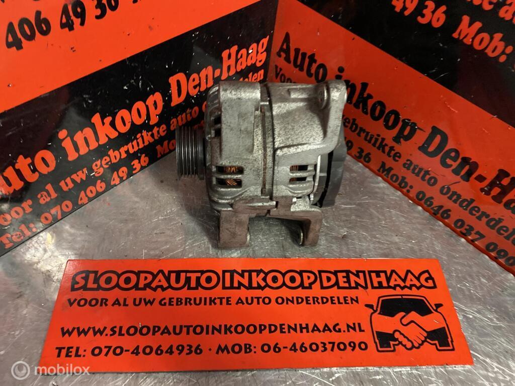 Opel Corsa Tigra ('00-'10) 1.2/1.4 Dynamo - 0124425010, Gebruikt, Opel, Ophalen of Verzenden, Opel
