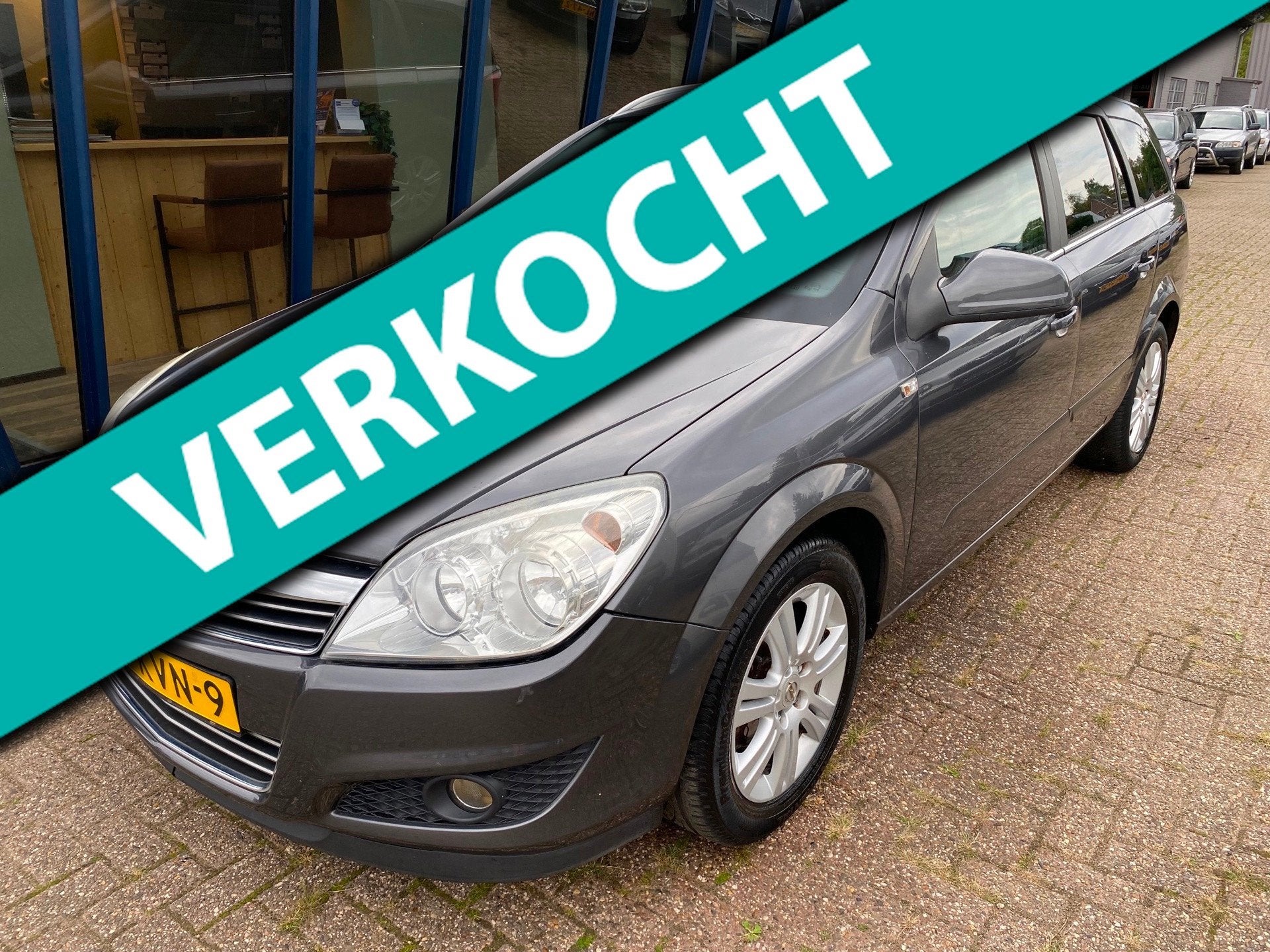 Opel Astra Wagon 1.6 Cosmo LEER / NAVI / TREKHAAK, Voorwielaandrijving, Dealer onderhouden, 15 km/l, Gebruikt