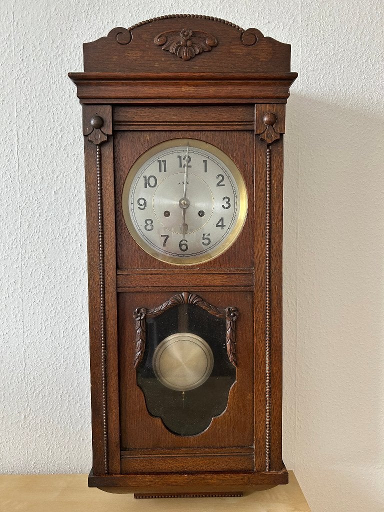 antieke wandklok ca 1926, Ophalen