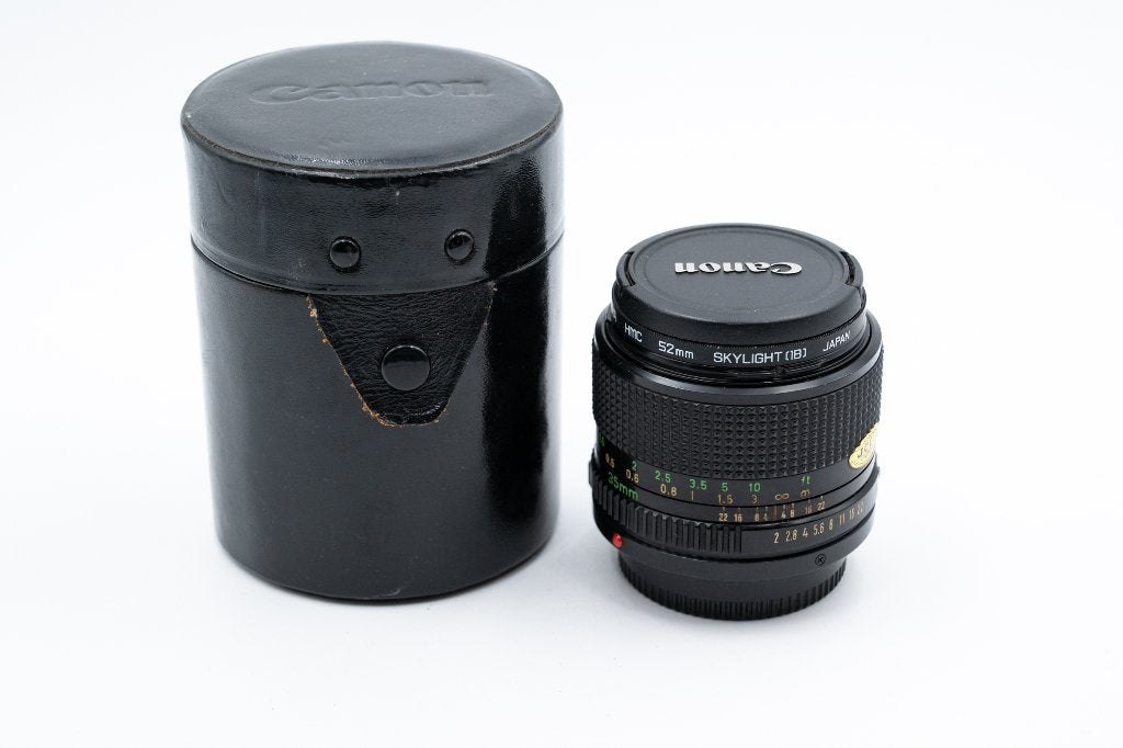 Canon nFD 35mm f/2 + hoesje, Audio, Tv en Foto, Fotografie | Lenzen en Objectieven, Gebruikt, Groothoeklens, Canon, Canon FD, Multi-coated