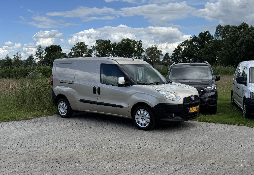 Fiat Doblo Cargo 1.4 Benzine L2 Verlengd Airco Schuifdeur, Auto's, Voorwielaandrijving, Euro 5, Stof, Zwart