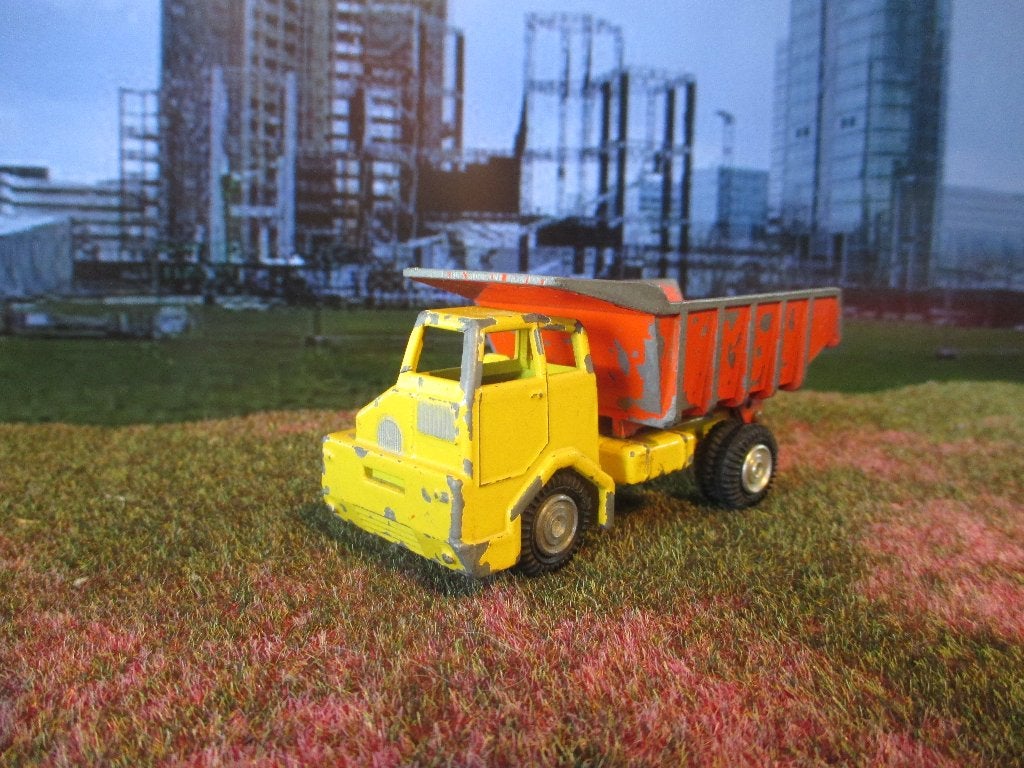 1/?? Faun Meiller Kipper Gama geel + oranje, Hobby en Vrije tijd, Modelauto's | 1:50, Ophalen of Verzenden, Gebruikt, Bus of Vrachtwagen