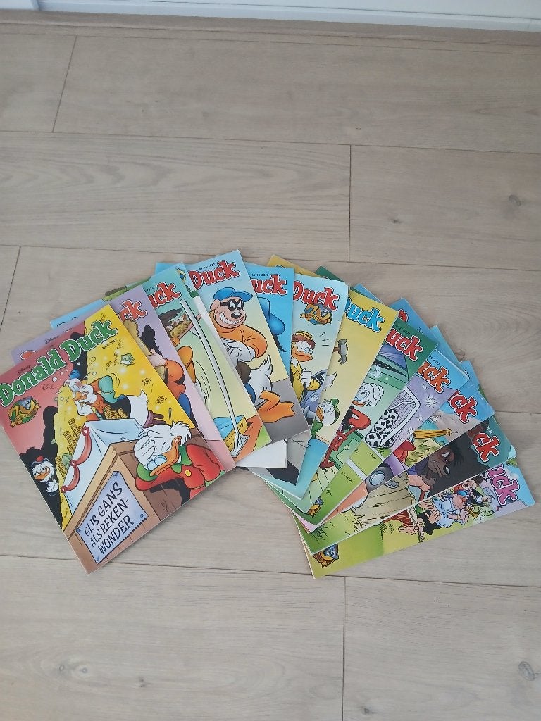 12 Donald ducks uit 2022, Boeken, Meerdere stripboeken, Ophalen of Verzenden, Gelezen