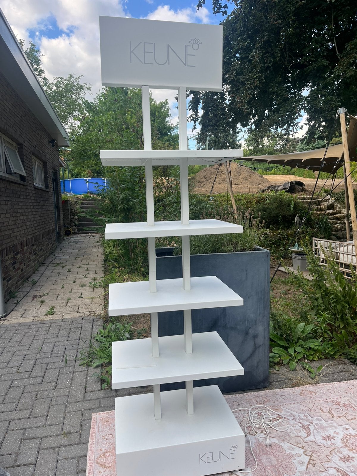 Keune producten rek, Ophalen