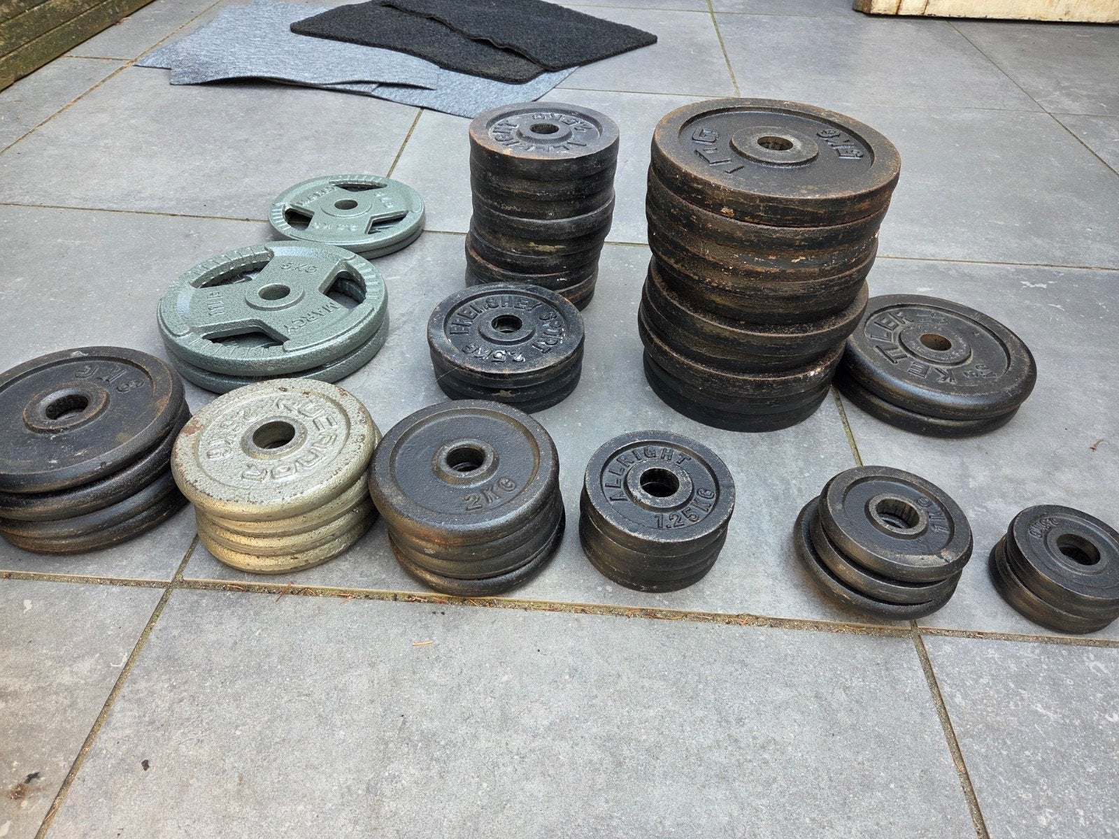 Grote set halterschijven en fitnessapparatuur, Ophalen
