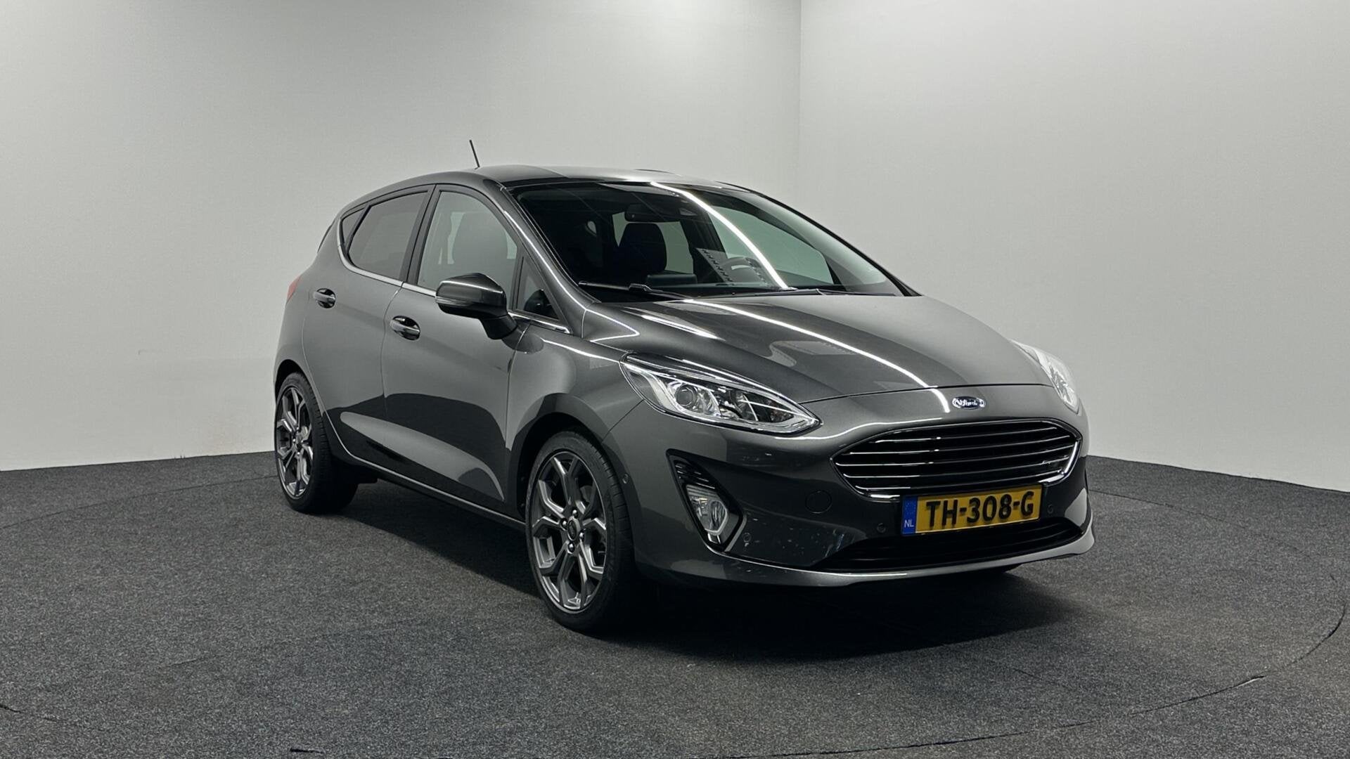 Ford Fiesta 1.0 EcoBoost Titanium TREKHAAK CARPLAY NAVI CRUI, Auto's, Stof, Gebruikt, Euro 6, Met garantie (alle)