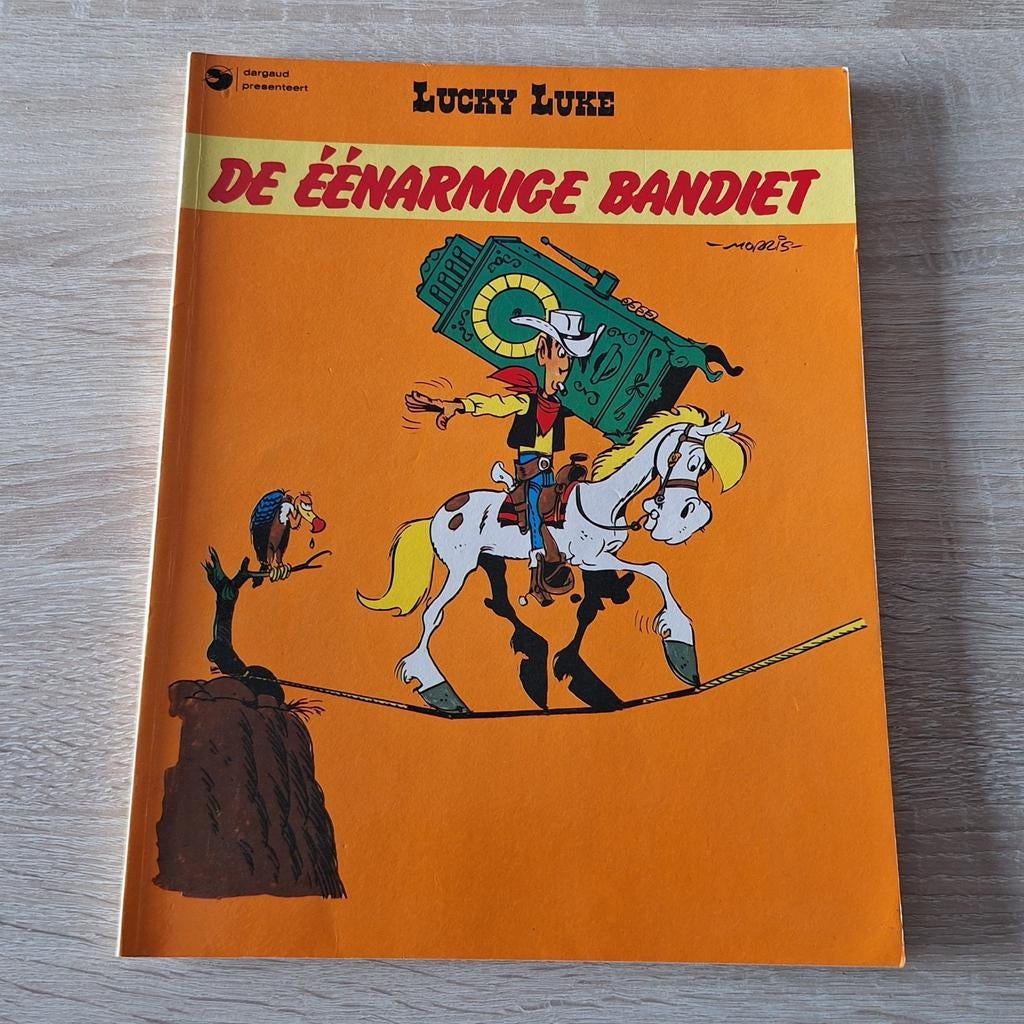 Lucky Luke 20 - De Eénarmige Bandiet, Boeken, Eén stripboek, Ophalen of Verzenden, Gelezen