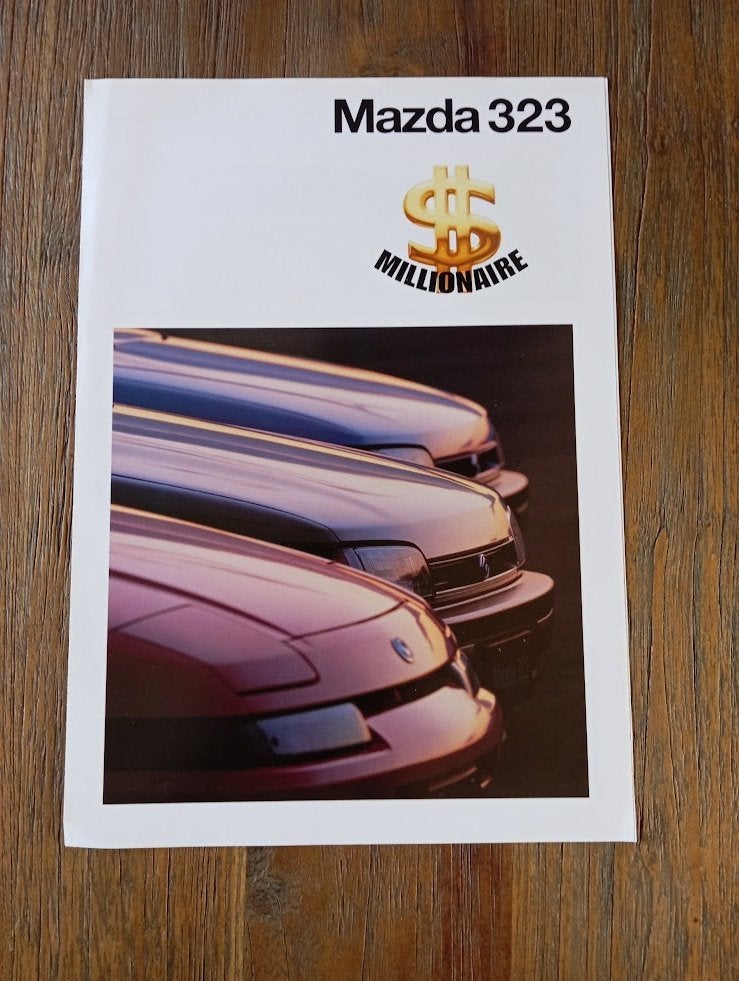 Mazda 323 Millionaire 4 / 1994 4 pag., Verzenden, Zo goed als nieuw, Mazda