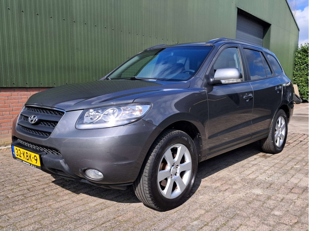 Hyundai Santa Fe 2.7i V6 Dynamic Black Premium| Nieuwe APK, Voorwielaandrijving, Dealer onderhouden, Santa Fe, Zwart