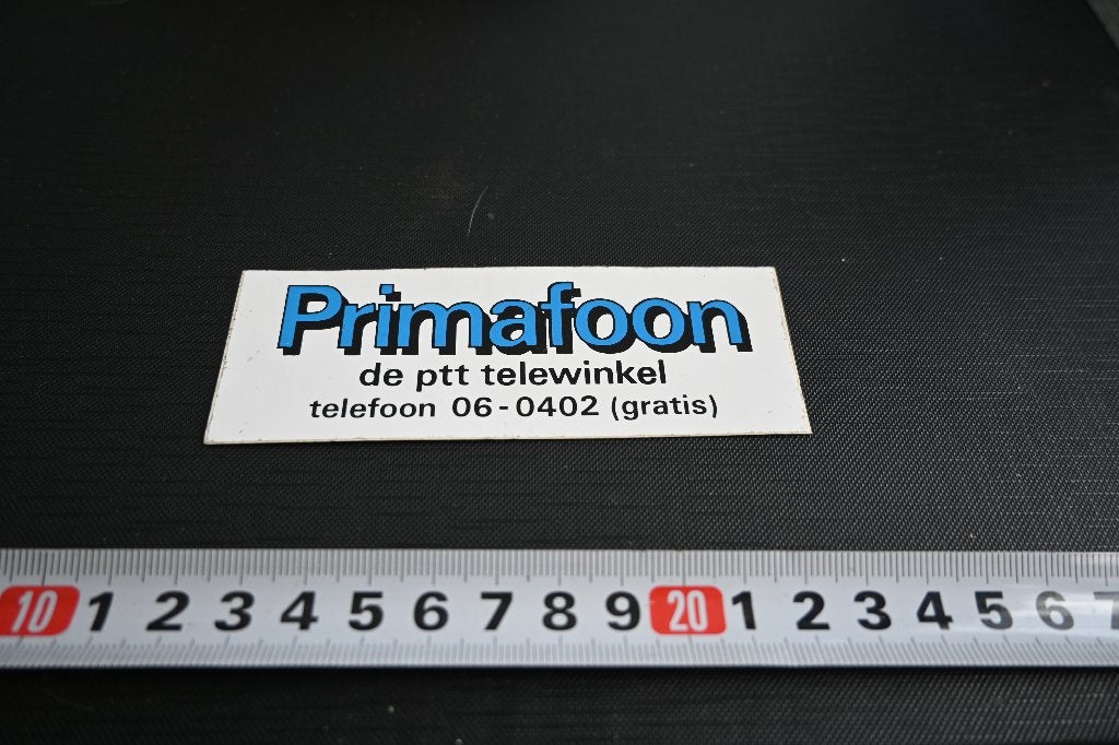 sticker PRIMAFOON de PTT telewinkel, Ophalen, Zo goed als nieuw