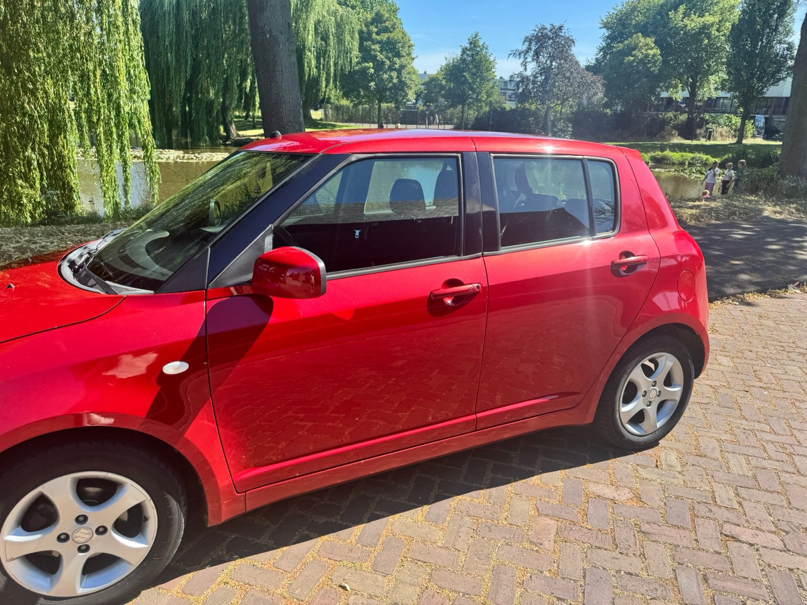 Suzuki Swift 1.3 5D 2005 Rood, Auto's, Voorwielaandrijving, 40 €/maand, 965 kg, 400 kg