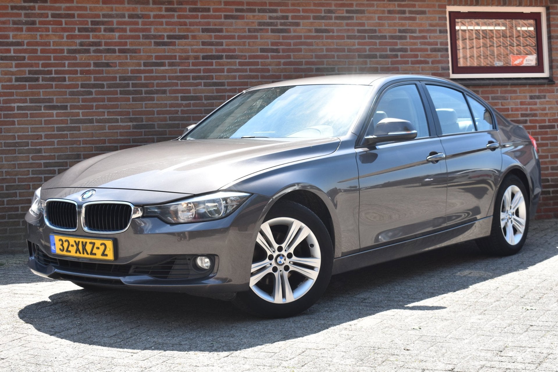 BMW 3-serie 320i Executive '12 Leder Navi, Auto's, BMW, Automaat, Euro 5, Achterwielaandrijving, Gebruikt
