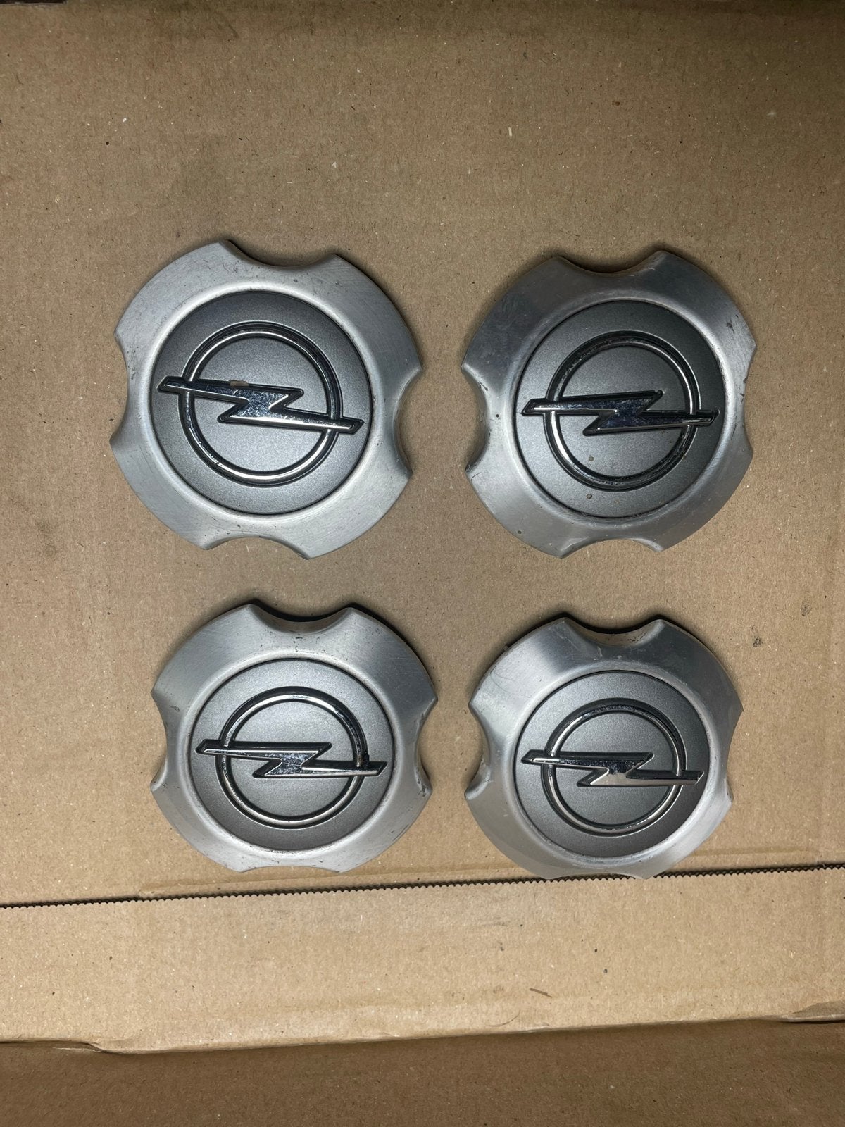 Opel naafdoppen set 13 153 232 LR en 13 153 234 LA, Auto diversen, Ophalen of Verzenden, Gebruikt