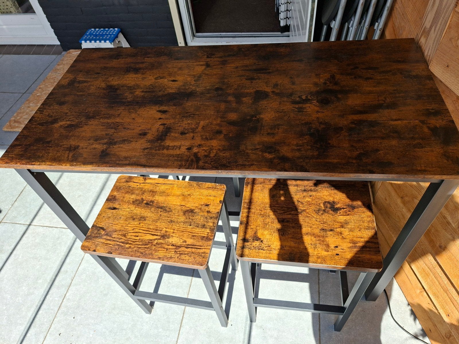 Bartafel met 4 krukken, Ophalen