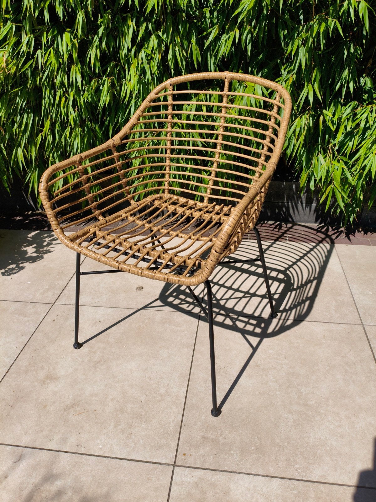 Rotan stoel met metalen onderstel €10, Ophalen, Gebruikt, Bruin, Metaal