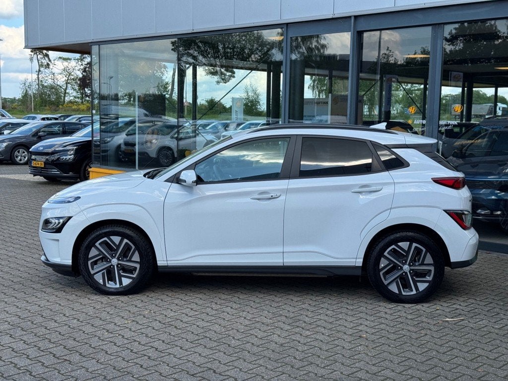 Hyundai Kona EV 64kWh Premium - Navi - camera - stoel/stuur, 12 maanden, 14 kWh, Gebruikt, Wit