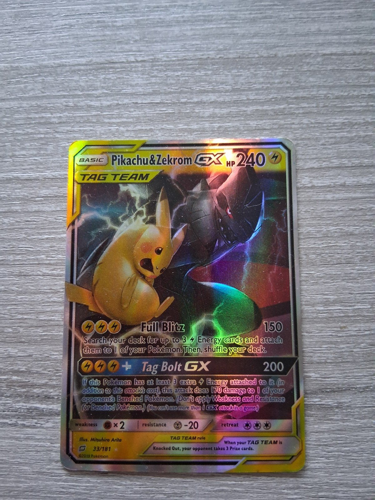 Pikachu & Zekrom GX Pokémon Kaart - Tag Team, Hobby en Vrije tijd, Ophalen of Verzenden, Gebruikt, Losse kaart, Foil