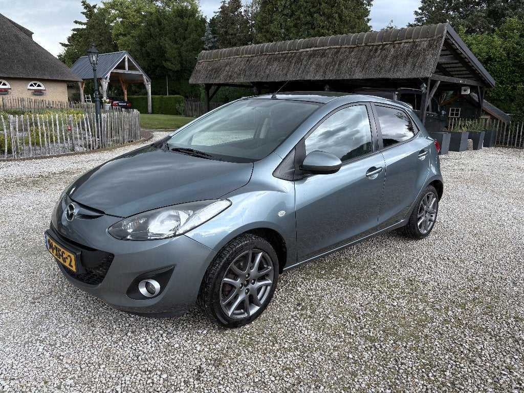Mazda 2 1.3 Bifuel 84pk Navigator GT, NAP, Lees tekst, Voorwielaandrijving, 37 €/maand, Zwart, 4 cilinders