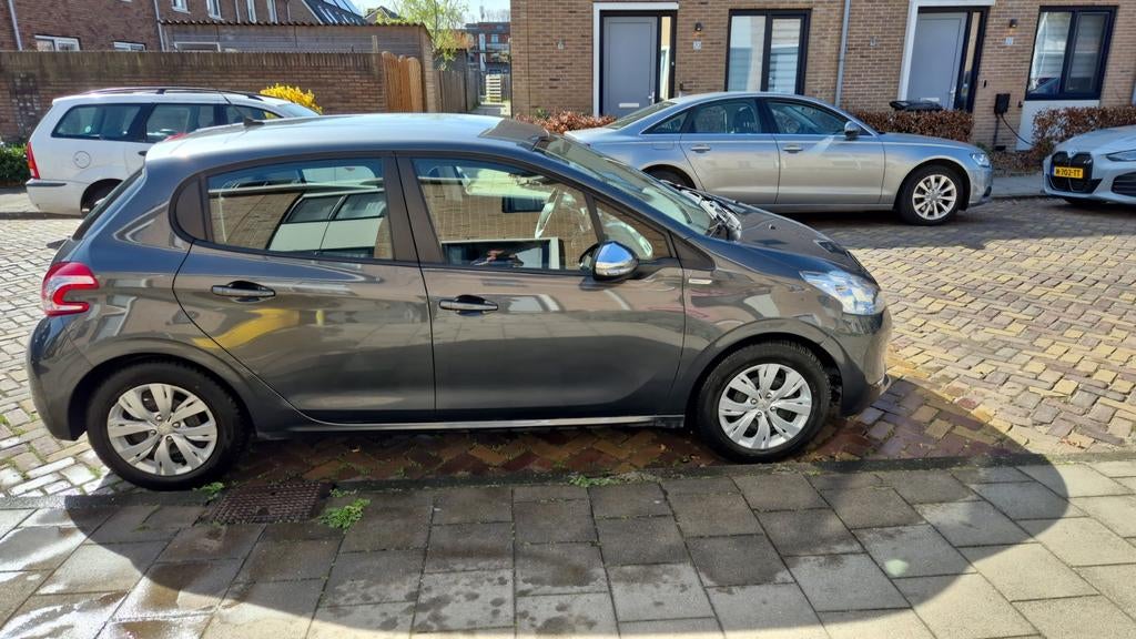 Peugeot 208 1.2 VTI 60KW/82PK 5-D 2013 Grijs, Auto's, Peugeot, Voorwielaandrijving, Stof, 1199 cc, Origineel Nederlands