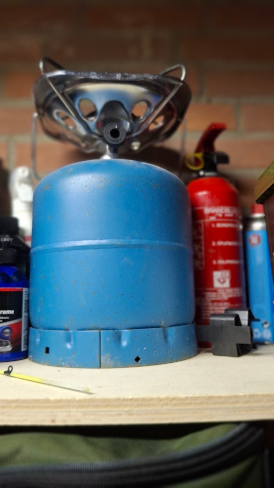 Gasfles met kookrek, Ophalen