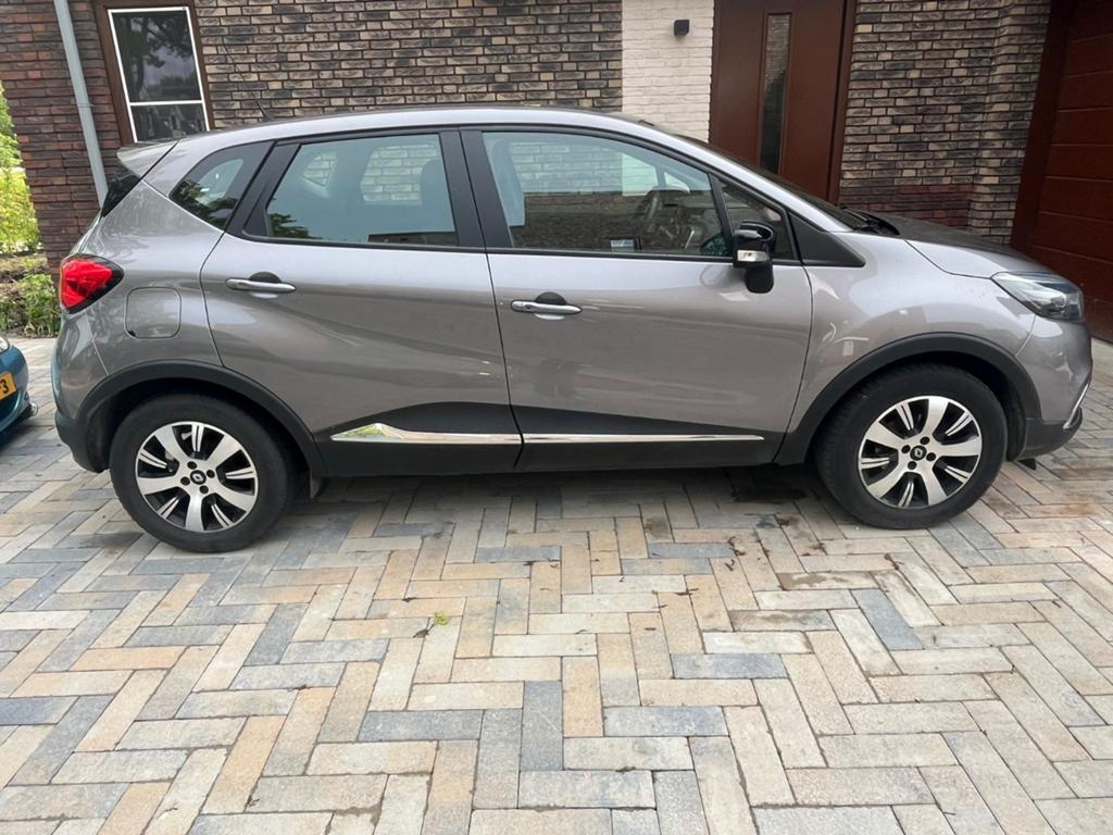 Renault Captur 0.9 TCE 90 2015 Grijs, Auto's, Renault, 898 cc, Leder en Stof, 49 €/maand, Origineel Nederlands