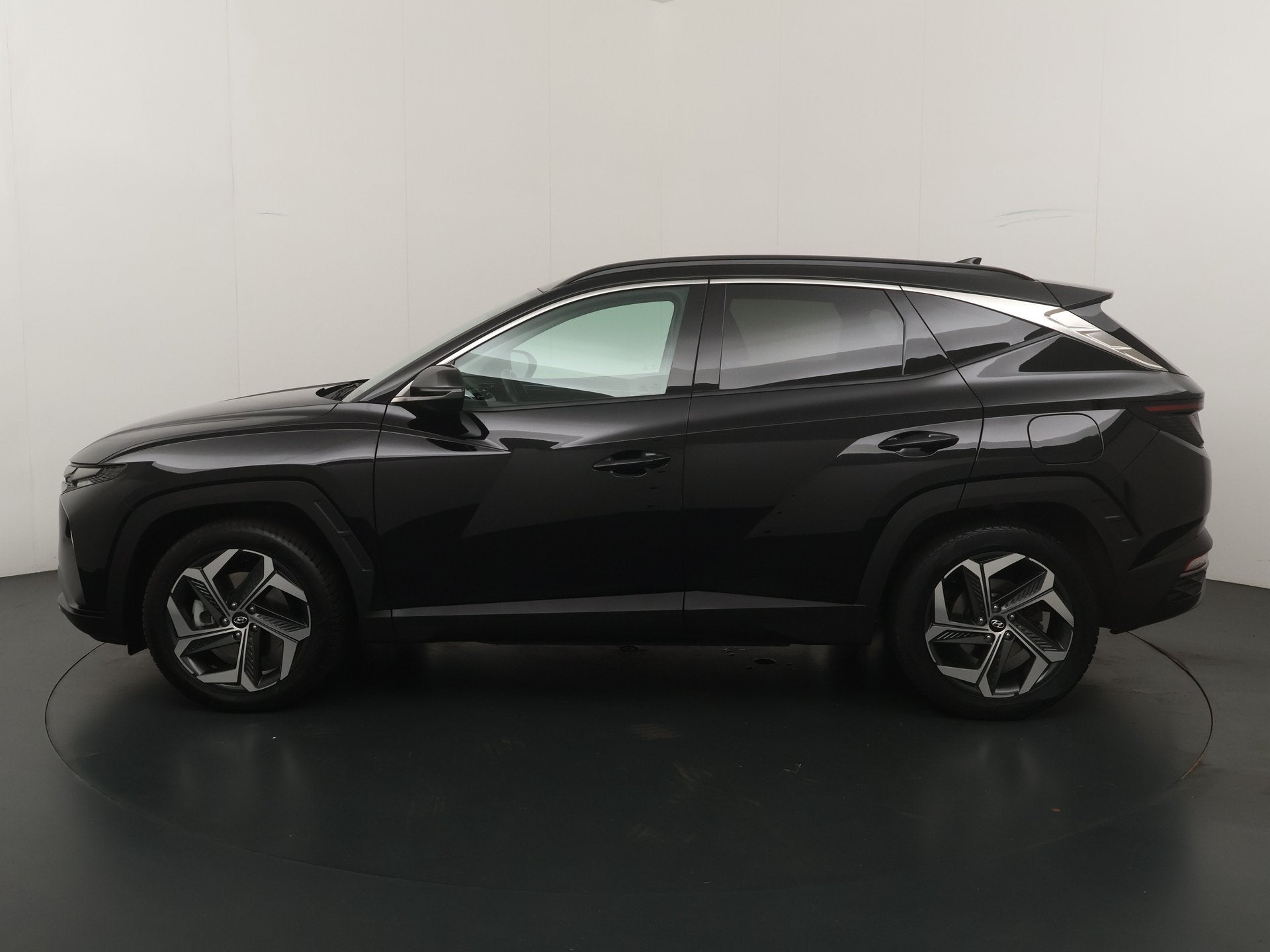 Hyundai Tucson 1.6 T-GDI PHEV 265pk Comfort 4WD | Trekhaak |, 1350 kg, Gebruikt, 4 cilinders, Zwart