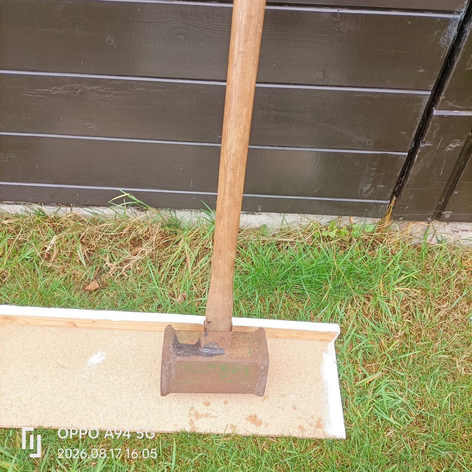 Zware slag met houten steel (paalhamerr), Ophalen, Gebruikt