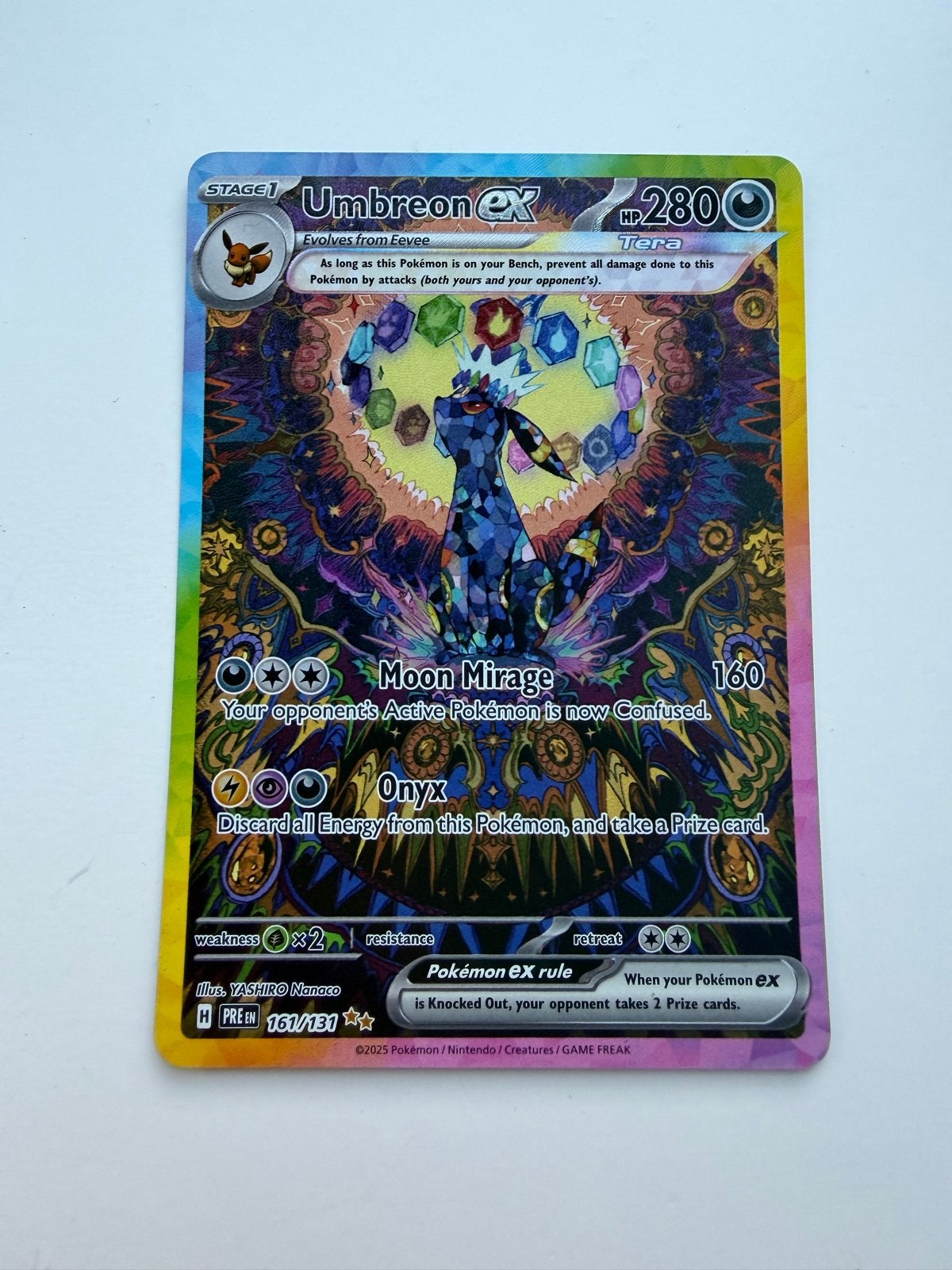 Foto 2 van Umbreon EX 161/131 - Prismatic Evolution