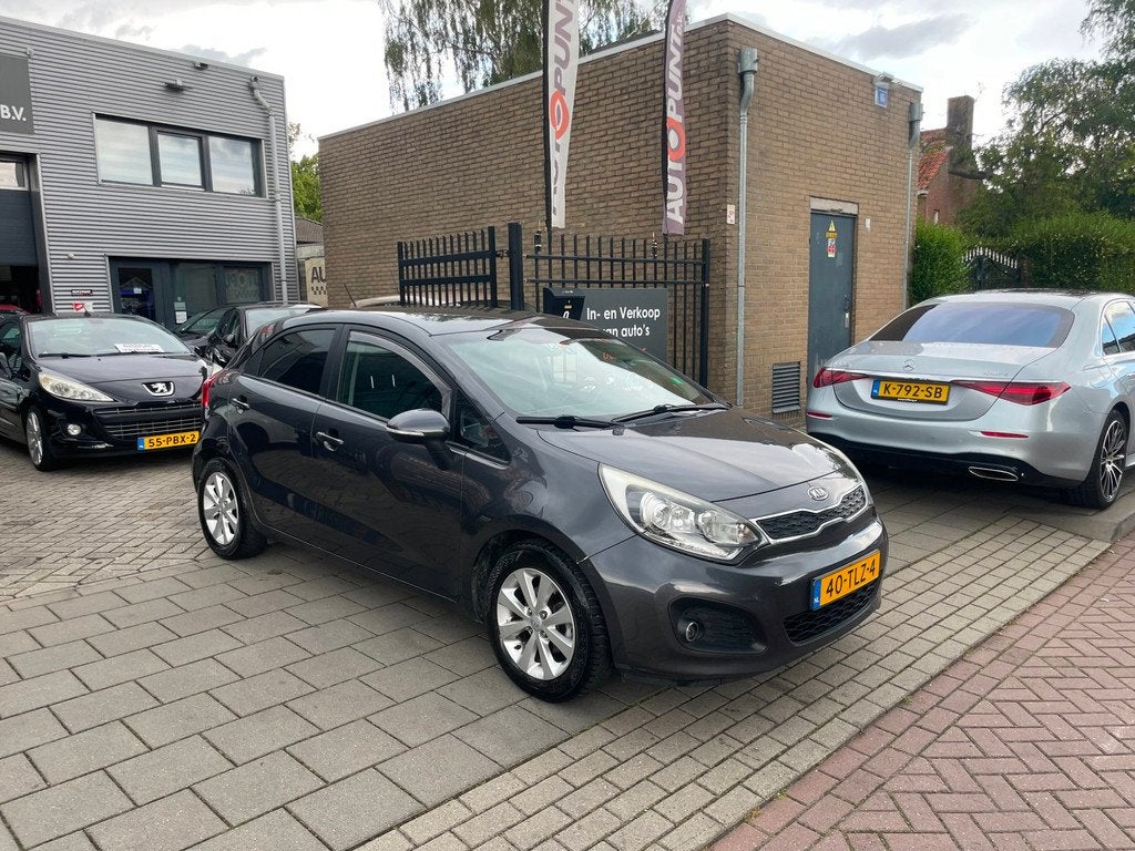 Kia Rio 1.2 CVVT Super Pack Trekhaak Airco PDC NAP APK, Auto's, Euro 5, 4 cilinders, Origineel Nederlands, Bedrijf