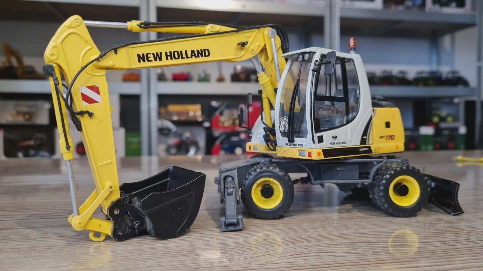 New Holland WE170 Profarmtoys, Overige merken, ., Tractor of Landbouw, Ophalen of Verzenden