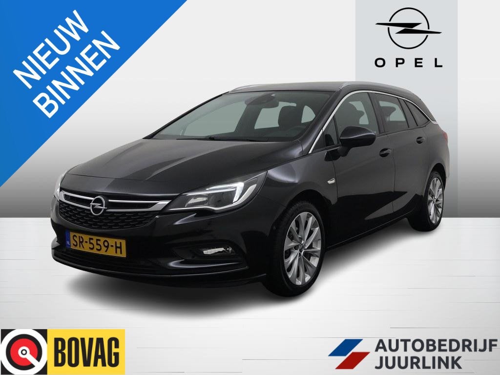 Opel Astra Sports Tourer 1.4 Business Executive Cam/Trekhaak, Auto's, Voorwielaandrijving, Dealer onderhouden, Gebruikt, 4 cilinders