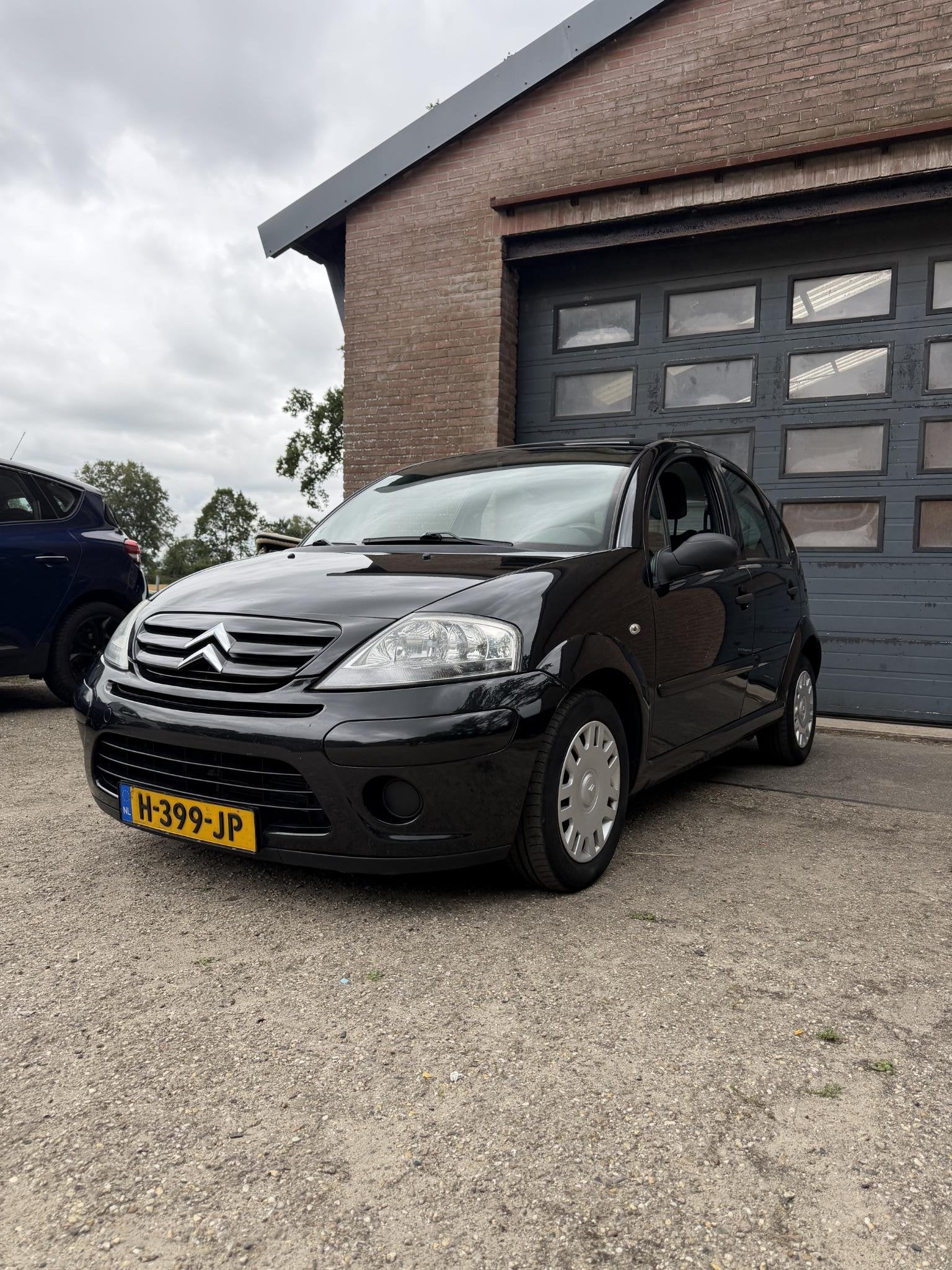 Citroen C3 1.1i First Airco/elektrisch dakraam/, Auto's, Citroën, Voorwielaandrijving, Stof, 60 pk, 920 kg