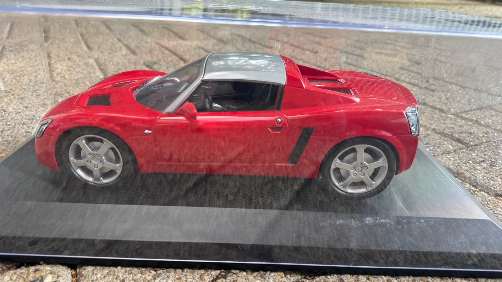 Rode Opel Speedster 1:12 modelauto, Hobby en Vrije tijd, Ophalen of Verzenden, Gebruikt, 1:9 t/m 1:12, Auto
