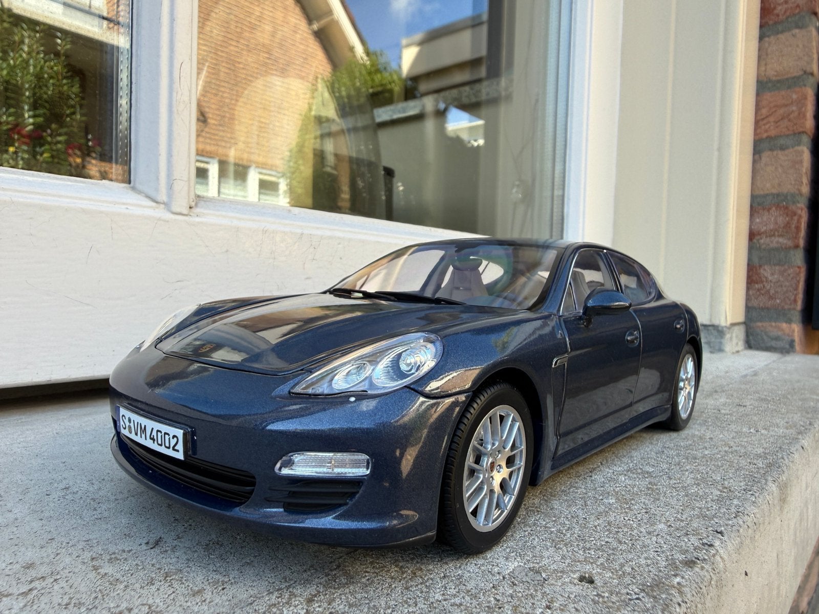 1:18 Porsche Panamera 4S Yachting Blue 2009 Norev Dealer, Auto, Norev, Norev, Zo goed als nieuw