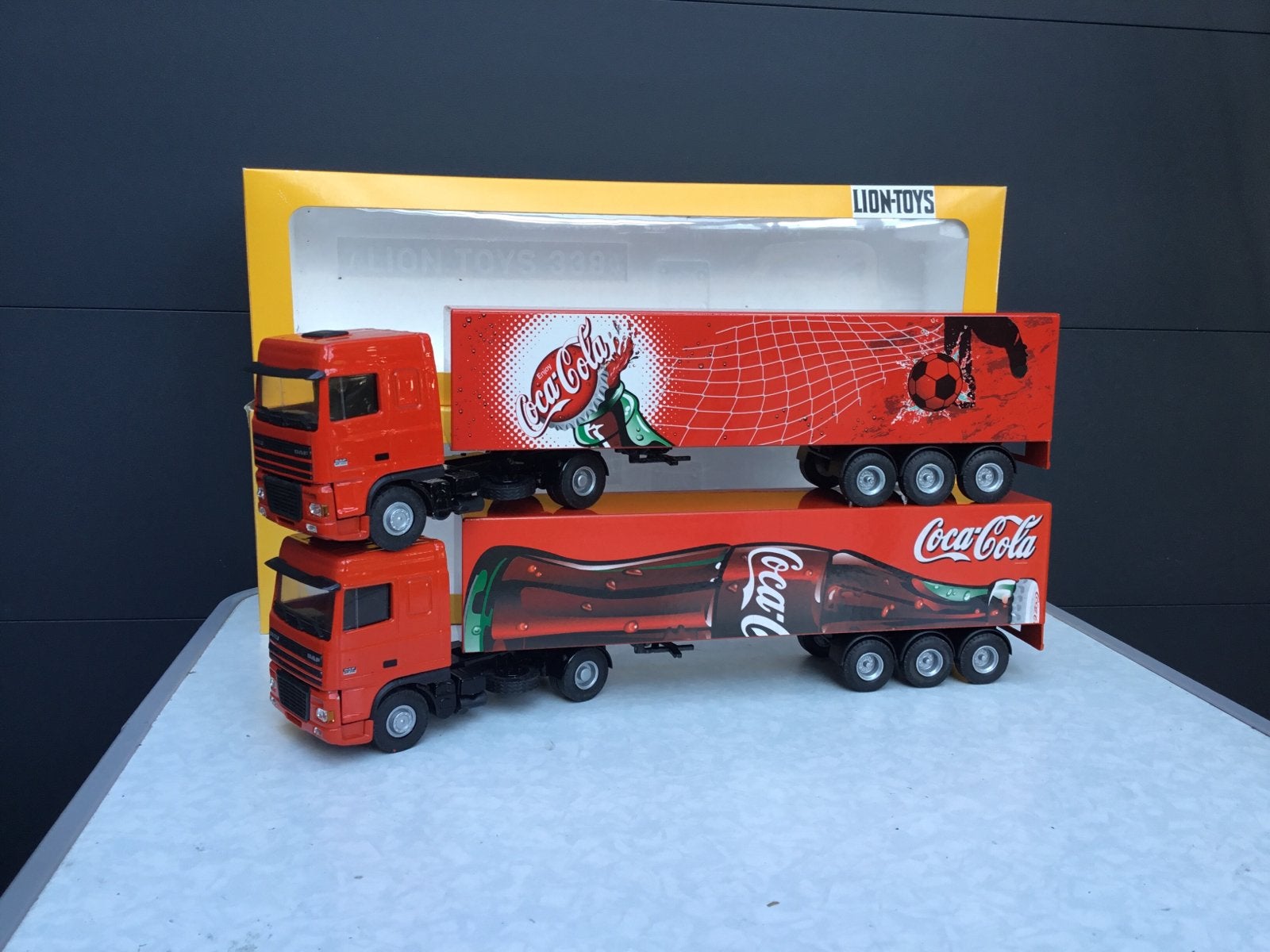 2 X Lion Car Daf 95 XF Coca Cola in ovp, Ophalen of Verzenden, Zo goed als nieuw, Bus of Vrachtwagen, Lion Toys